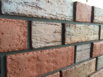 3 materiais de construção perfurados girados furos dos tijolos da argila da cor